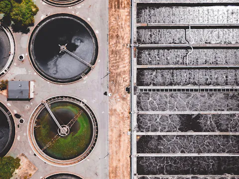 Aerial view of circular tanks at a water treatment works